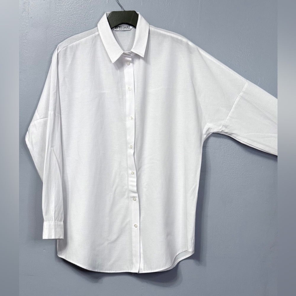 #10)  Elegant White Women's Button Down Shirt